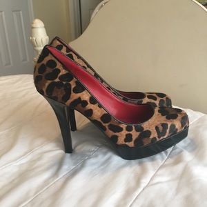 Nine West leopard print platform shoes.